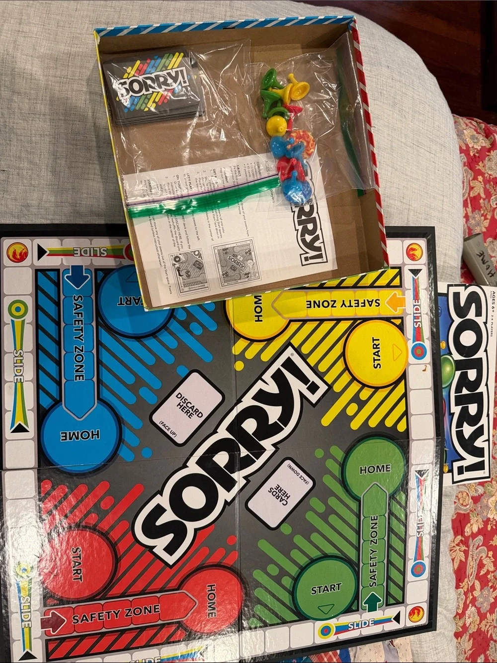Sorry! Board Game with Red, Blue, Yellow, Green Game Pieces